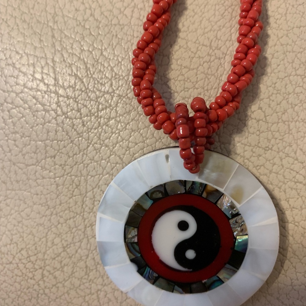 Yin-Yang necklace.